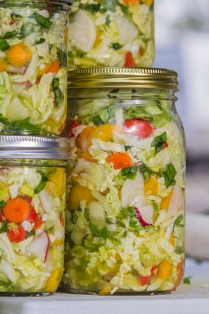 Homemade fermented vegetables in glass jars