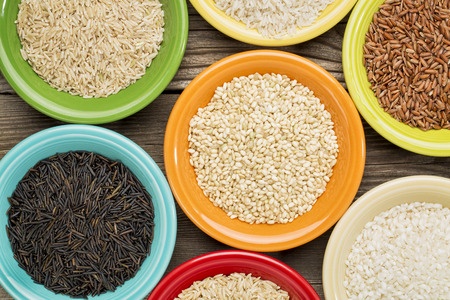 Photo of a variety of rice grains, which are traditionally considered gluten-free foods