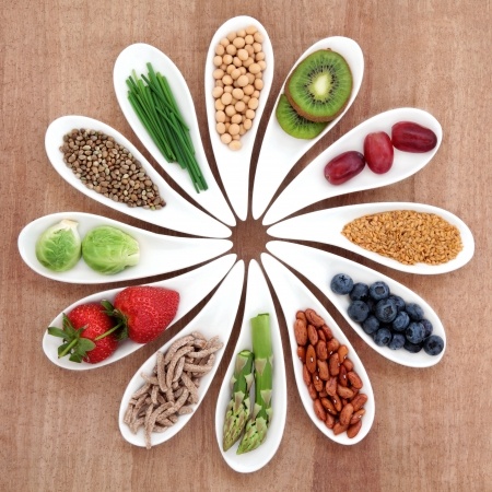 One gluten-free diet tip is to eat nutrient-dense whole foods and superfoods. The photo shows a variety of such foods.
