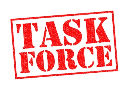 Task force rubber stamp in red letters